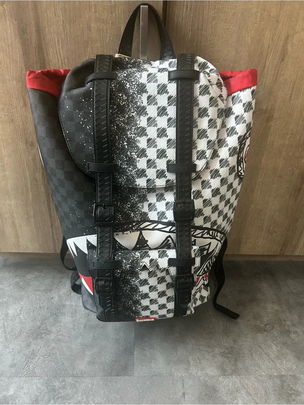 SPRAYGROUND SCRIBBLE DRIBBLE CHECK HILLS BACKPACK